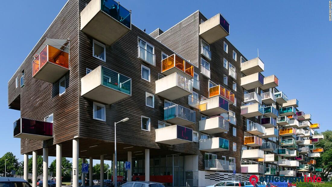 Покупка социальное жилье. WOZOCO Apartments. Амстердам. Среднеэтажная жилая застройка Амстердама. Голландия архитектура малоэтажный жилой комплекс. Современная многоэтажная застройка.